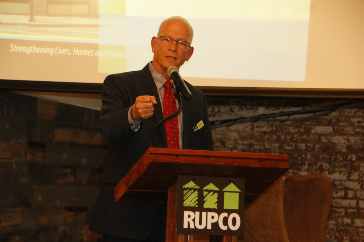 man speaking at Rupco event